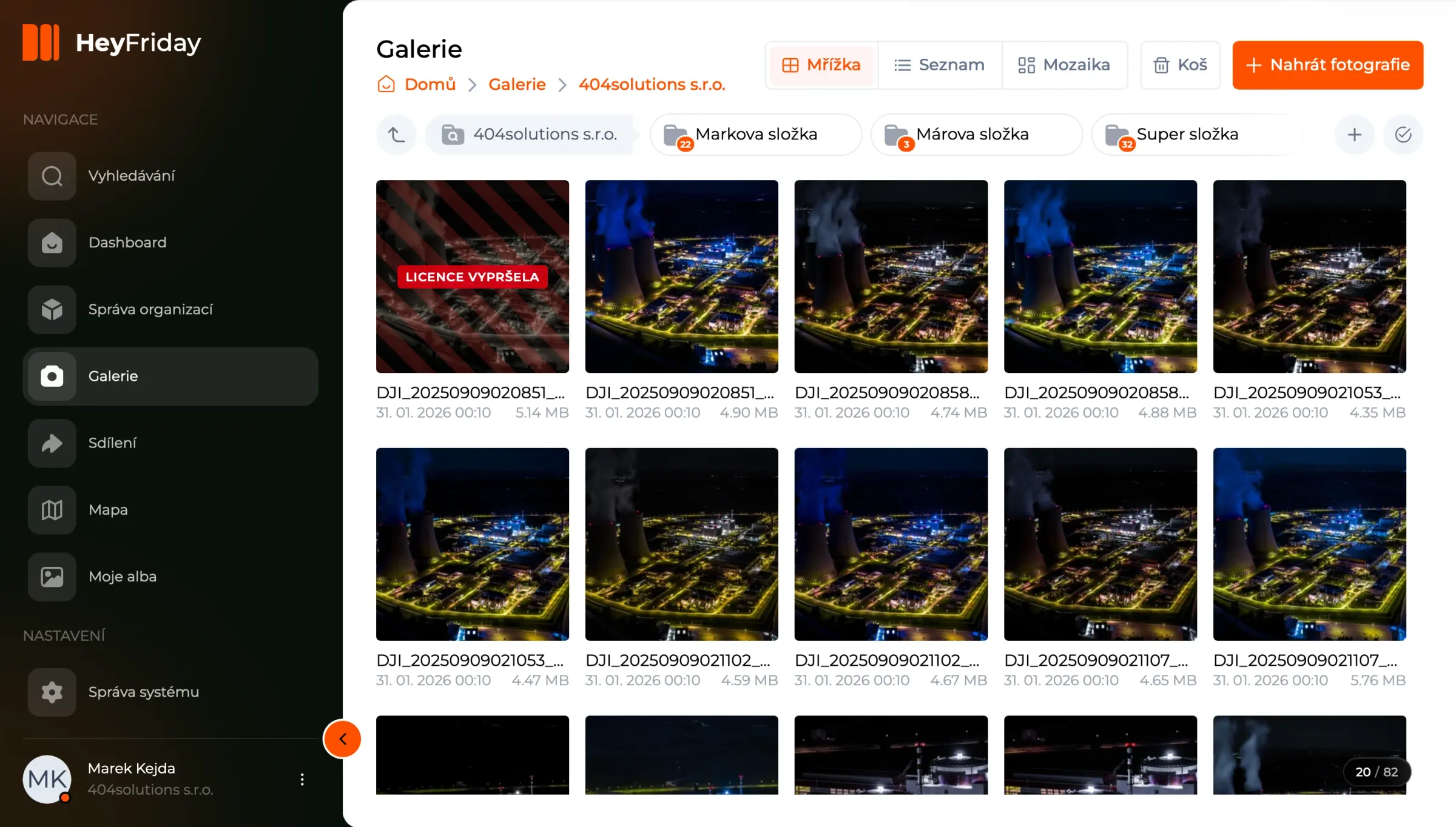 The gallery in the running HeyFriday application as a grid: folders, photo thumbnails each with a date and size, one of them tagged Licence expired